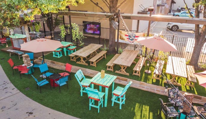 Artificial grass installed on an outdoor restaurant patio