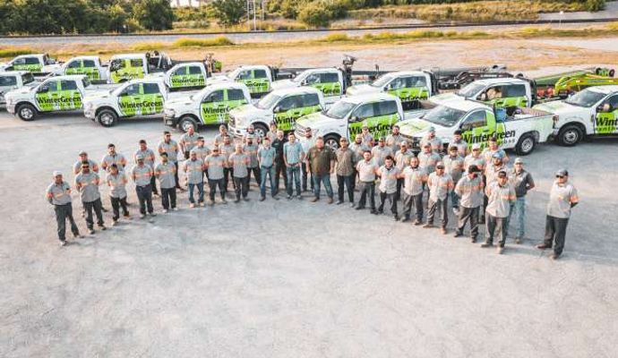 WinterGreen Synthetic Grass installation team with service vehicle